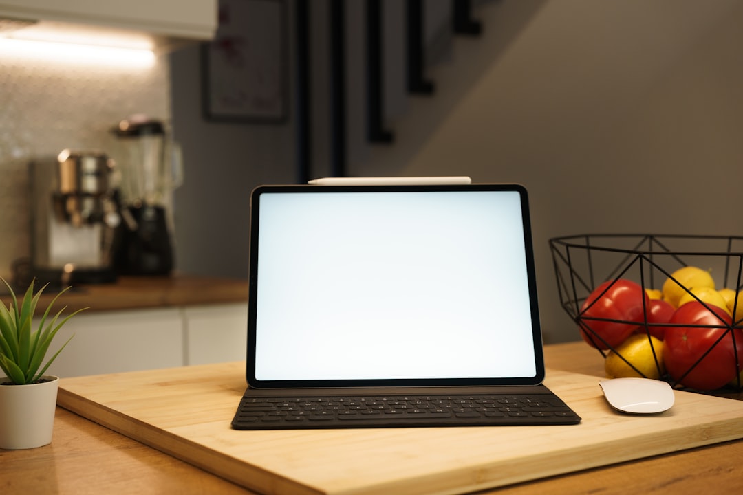 Homeowner reviewing ComEd energy usage report on laptop